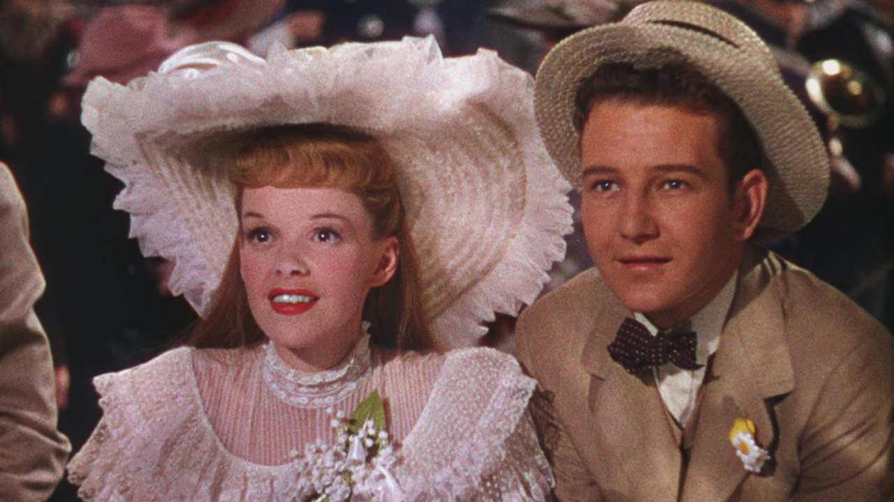 a woman and man in wide brim hats